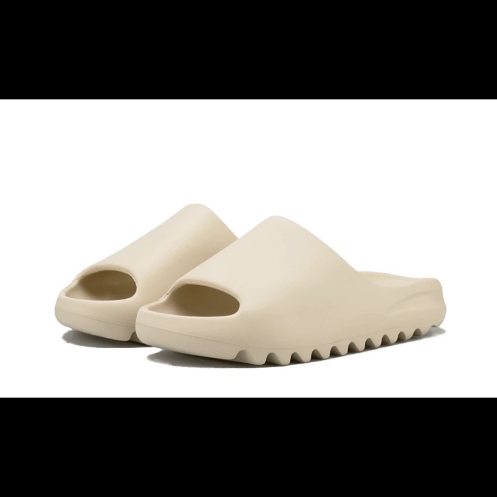 I am selling these Beige Yeezy slides, size 8, condition is new only worn once.